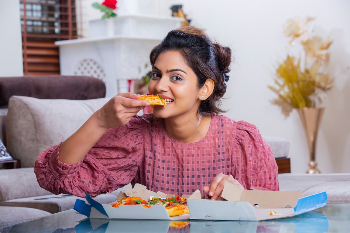 Eating Pizza stock photo